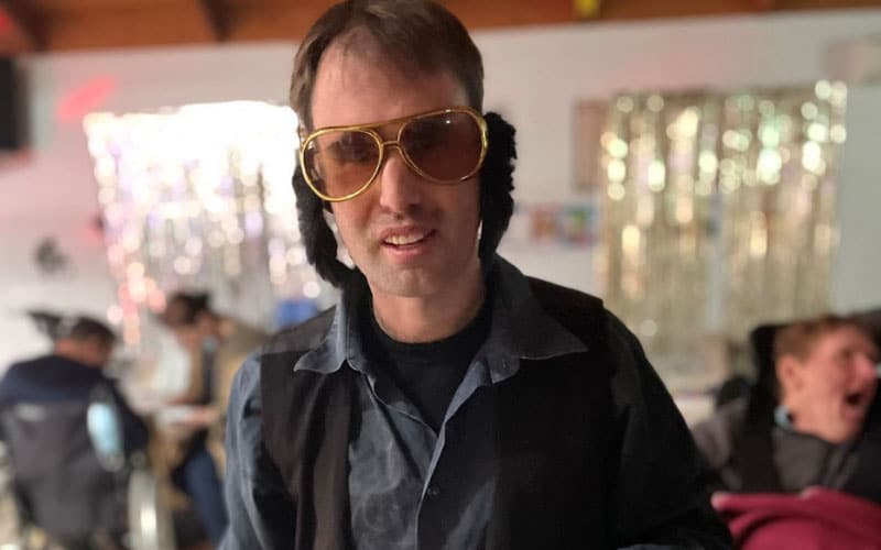 Young man dressed as Elvis for a Disco Party